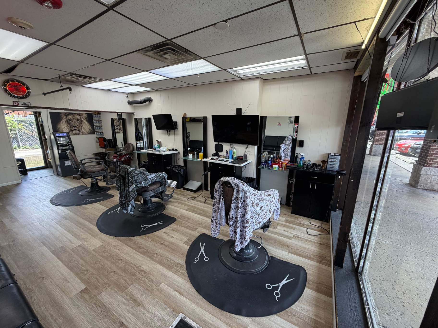 Three barber stations ready for walk-ins